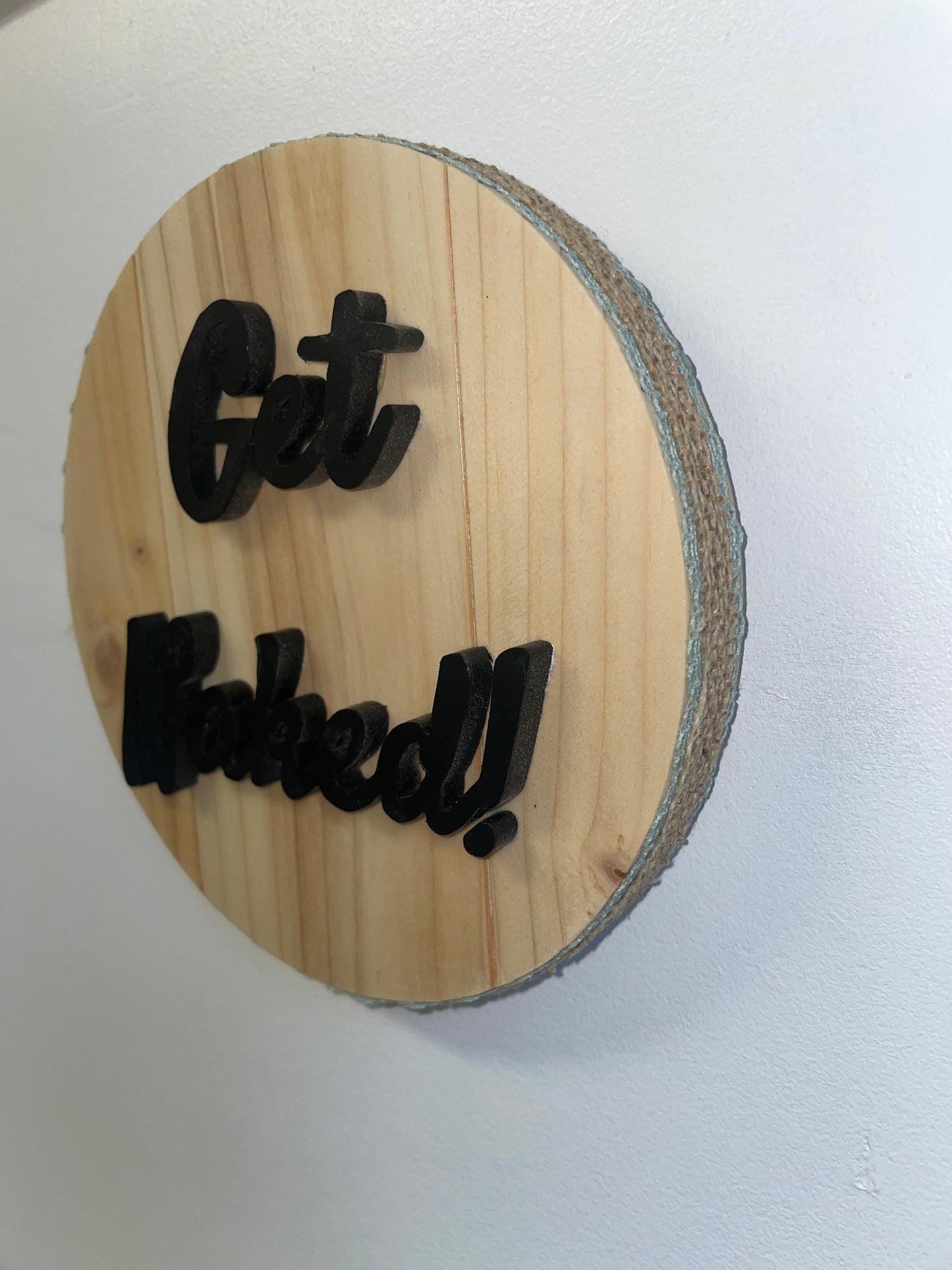 “Get naked” bathroom sign